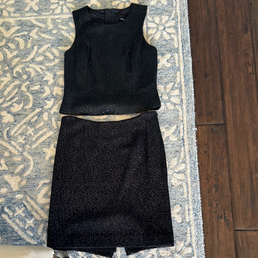 Elegant Black Sleeveless Top and Skirt